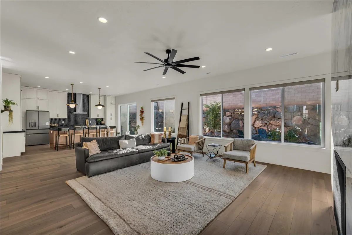 Open-concept living room and kitchen with modern finishes